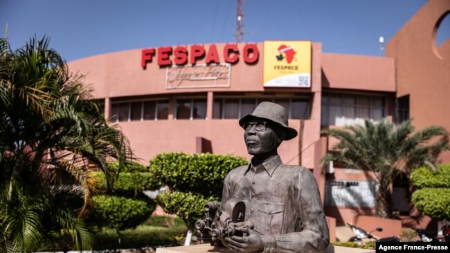 A statue of Paulin Soumanou Vieyra, considered the precursor of African cinema, stands in Pan-African Film and Television Festival headquarters, in Ouagadougou, on Oct. 14, 2021.