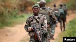 Des militaires de l’armée congolaise à Beni, dans le Nord-Kivu, 31 décembre 2013.