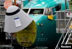 The angle of attack sensor, at bottom center, is seen on a 737 Max aircraft at the Boeing factory in Renton, Washington, U.S., March 27, 2019. REUTERS