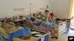 Rebel fighters, who were injured during fighting at Bab al-Aziziya, rest at Maitika Hospital, in Tripoli, Libya, August 27, 2011