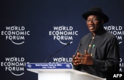 Nigerian President Goodluck Jonathan speaks at the opening session at the World Economic Forum in Abuja, May 8, 2014.