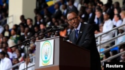 Rwandan President Paul Kagame delivers a speech during the commemoration of the 20th anniversary of the Rwandan genocide, in Kigali, April 7, 2014. A court ruling paved the way for Kagame to amend the constitution and seek another seven-year term. 