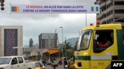 A banner reads 'Nigeria - an ally in the fight against terrrorist group Boko Haram' in Yaounde, Cameroon, July 28, 2015.