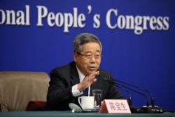 中國教育部長陳寶生在北京舉行全國人民代表大會期間出席新聞發布會。 (2018年3月16日)