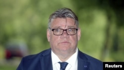 FILE - Finland's Foreign Minister Timo Soini attends a news conference in Vantaa, Finland, Aug. 14, 2018. 