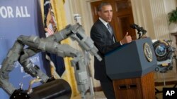 President Barack Obama speaks about manufacturing innovation institutes in the East Room of the White House, Feb. 25, 2014.