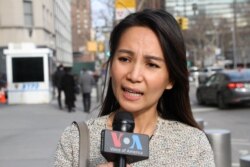 FILE-Kem Monovithya, deputy director of public affairs for CNRP in an interview with VOA in front of the U.S. Mission to the United Nation Building in New York City on December 19, 2017. (Say Mony/VOA Khmer)