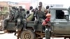 Congolese soldiers are seen on a pick-up truck after dispersing civilians protesting against what they say is the government's failure to stop killings and inter-ethnic tensions in the town of Butembo, North Kivu province, DRC, Aug. 24, 2016.