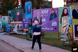 Campaign posters for parliamentary elections adorn a street in Baghdad, Iraq, April 30, 2018.