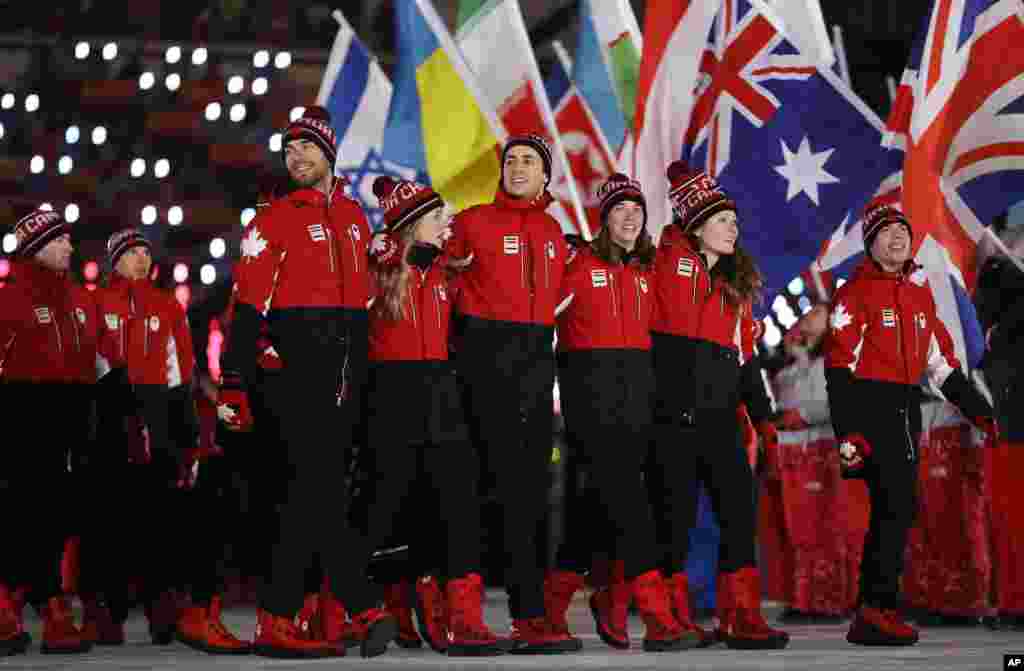 Canadian athletes walk into the stadium during the closing ceremony of the 2018 Winter Olympics in Pyeongchang, Feb. 25, 2018.