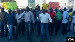 MDC-T youths clashed with police in Chitungwiza on Saturday protesting against the alleged abduction of political activist Itai Dzamara by state security agents. 
