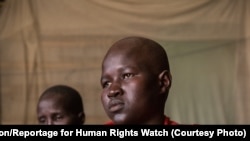 Sixteen-year-old Akuot, shown here in Bor, Jonglei state, in Feburary 2013, was beaten for three days after she refused to be married off in exchange for a dowry of cattle. 