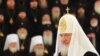 Между Кремлем и оппозицией: Церковь как посредник?