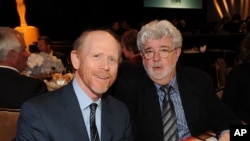 FILE - Directors Ron Howard, left, and George Lucas attend the Academy of Television Arts & Sciences 22nd Annual Hall of Fame Gala in Beverly Hills, California, March 11, 2013.