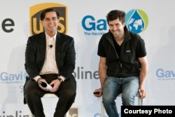 FILE - Zipline CEO Keller Rinaudo (R) is shown with Eduardo Martinez, president of The UPS Foundation. (Photo Courtesy of UPS)