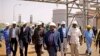 Members of a high level government delegation from Juba visit oil fields of Paloich, South Sudan, Feb. 21, 2012.
