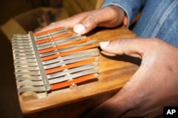 Hugh Tracey’s simpler version of the mbira…. He called it the kalimba
