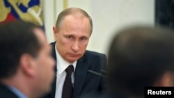 Russian President Vladimir Putin chairs a meeting of the Security Council in Moscow's Kremlin, March 21, 2014. 