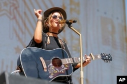 Maren Morris performs at the CMA Music Festival at the Chevrolet Riverfront Stage, June 9, 2016, in Nashville, Tennessee.