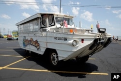 A duck boat sits in the parking lot of Ride the Ducks, an amphibious tour operator in Branson, Missouri, July 20, 2018.