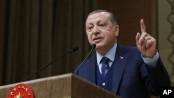 Presiden Turki Recep Tayyip Erdogan memberikan sambutan di Istana Presiden di Ankara, Turki, 20 Desember 2017. (Foto: dok).