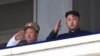 북한 김정은 국방위 제1위원장(오른쪽)과 최룡해 당시 군 총정치국장이 지난 2013년 7월 평양에서 한국전 정전 60주년 기념 열병식을 지켜보고 있다. (자료사진)