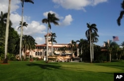 Mar-a-Lago is seen from the media van window in Palm Beach, Fla. Trump has described the sprawling Mar-a-Lago property as the Winter White House and has spent two weekends there this month.