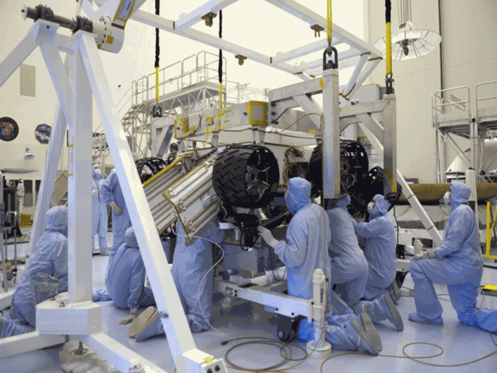 Technicians at NASA's Kennedy Space Center in Florida, prepare NASA's Mars Science Laboratory (MSL) rover for testing. (NASA/Dimitri Gerondidakis)