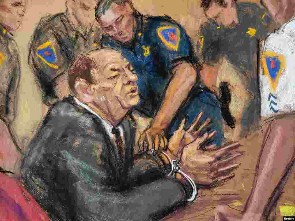 This courtroom drawing shows former movie producer Harvey Weinstein in handcuffs after a guilty finding is announced in his sex crimes trial, in the Manhattan area of New York City, Feb. 24, 2020.