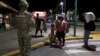 Mexican Authorities Move Camping Migrants 