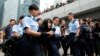 Hong Kong Begins Clearing Remaining Protest Sites