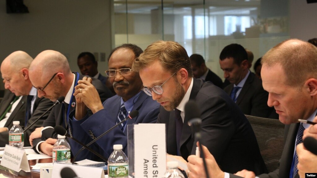 Somali Finance Minister Abdirahman Duale Beileh (center) is seen flanked by participants of International Monetary Fund (IMF) and World Bank meetings last week in Washington. (Twitter - @DrBeileh)