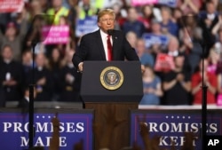President Donald Trump addresses the audience during a rally at the Four Seasons Arena at Montana ExpoPark, July 5, 2018, in Great Falls, Mont., in support of Rep. Greg Gianforte, R-Mont., and GOP Senate candidate Matt Rosendale.