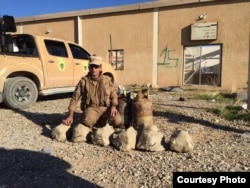 Jamal Syare, a Kurdish commander, shows detonated IS homemade stone-shaped bombs and propane tank bombs in Khazir, north of Mosul. (Photo courtesy of Jamal Syare)