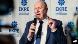 FILE - Chairman of the Estonian Conservative People's Party (EKRE) Mart Helme speaks at the headquarters after parliamentary elections in Tallinn, Estonia, March 4, 2019.