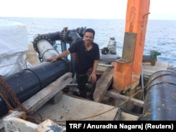 Hidayathulla Chekkillakam, a government employee, inspects the desalination plant on Kavaratti island, the capital of India's Lakshadweep islands, May 6, 2018.