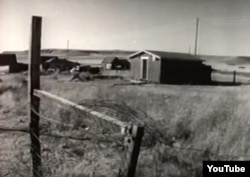 This screenshot from the 1958 NBC documentary "The American Stranger" shows the impoverished community of landless Cree and Chippewa Indians known as Hill 57, outside Great Falls, Montana.