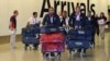 Integrantes del equipo olímpico de Italia cuando llegaban al aeropuerto de Heathrow, en la capital británica.