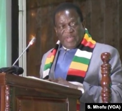 Zimbabwe’s President Emmerson Mnangagwa addressing his first campaign rally in Harare on July 5, 2018 after surviving an explosion at a rally he was addressing late last month.
