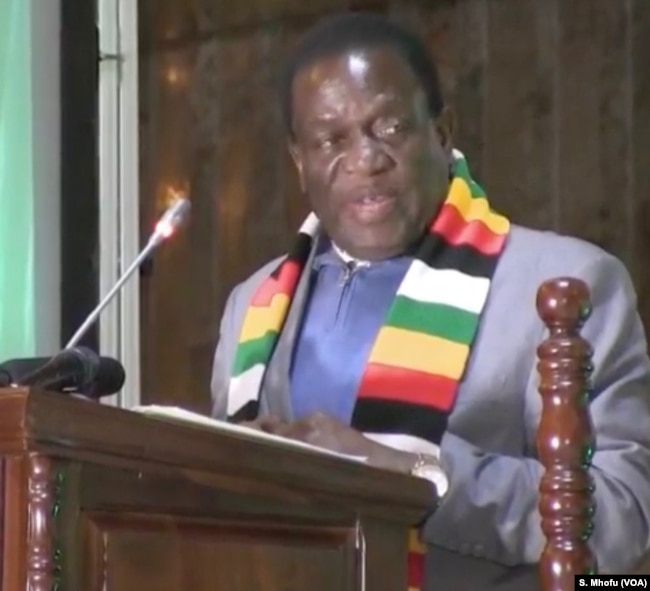 Zimbabwe’s President Emmerson Mnangagwa addressing his first campaign rally in Harare on July 5, 2018 after surviving an explosion at a rally he was addressing late last month.