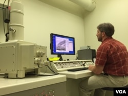 Scanning electron microscope analyzes type of paint to confirm parts match missing plane, Aug. 11, 2015. (Photo: Carolyn Presutti / VOA)