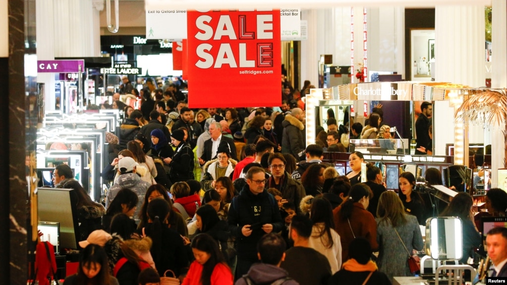 Shoppers are seen inside the Selfridges store on Oxford Street during the Boxing Day sales in central London, Britain December 26, 2018. 