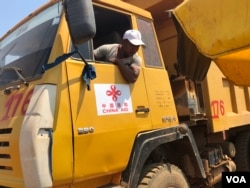 A construction worker drives a truck at the construction site of the new Cambodia-China Friendship Tboung Khmum Hospital in Cambodia's eastern Tboung Khmum province, in March 2019 (Sun Narin/VOA Khmer)