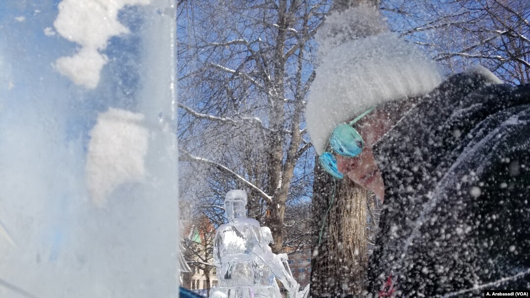 Deneena carving ice