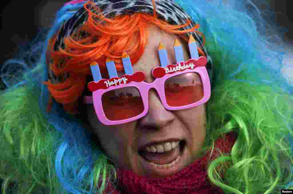 A participant shouts slogans during a rally, held to support women's rights and to protest against violence towards women, in Saint Petersburg, Russia, March 8, 2019.