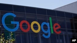 FILE - A Google logo is seen at the company's headquarters in Mountain View, California, July 19, 2016.