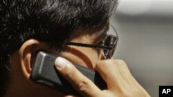 WHO Panel Cites 'Possible' Brain Cancer Risk from Cell Phone Use