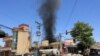 Suicide Bombers Raid Afghan Government Office 