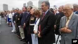 Hundreds of people attend ceremonies marking the 75th anniversary of the Battle of Midway, aboard a retired U.S. Navy aircraft carrier named for the epic World War II battle, in San Diego, June 5, 2017. 