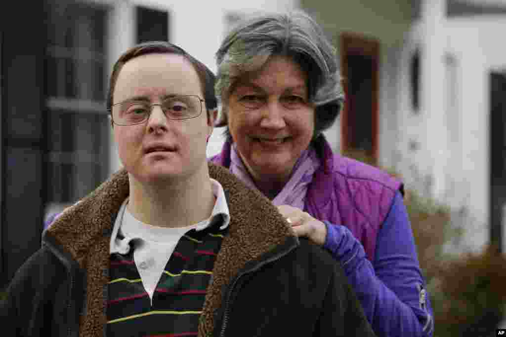 Matthew McMeekin poses with his mother, Bebe McMeekin at their home in Bethesda, Md. in this Feb. 10, 2014 file photo. Most Americans with intellectual or developmental disabilities remain shut out of the workforce, despite the ADA.